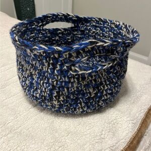 Handmade circular crochet basket with handles